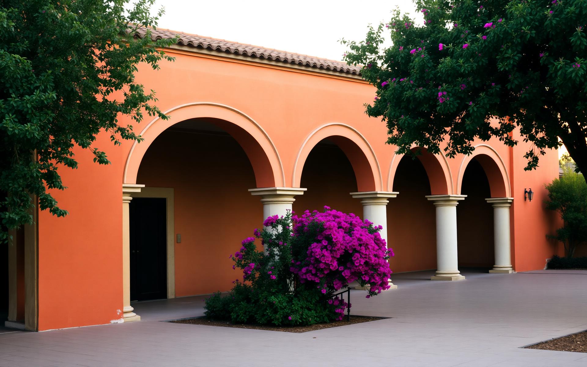 Mission San Juan Capistrano at golden hour — courtyard arches and bougainvillea